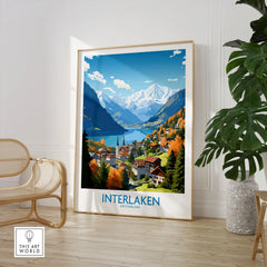 Interlaken Print in a large natural wood frame leaning in a room with a rattan chair and monstera plant