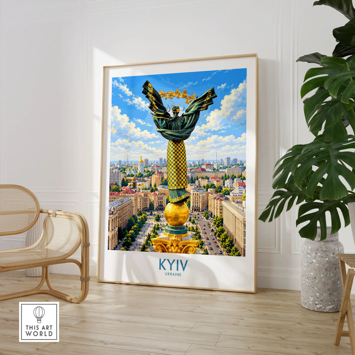 Kyiv Ukraine Maidan Square Wall Art — the Independence Monument rising above Maidan Nezalezhnosti and the Kyiv skyline, shown as large framed print room setting chair plant