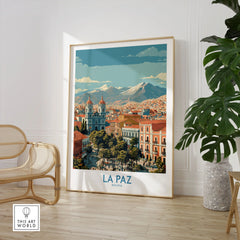 La Paz Bolivia Wall Art Poster - Bolivian Capital Travel Decor in a large natural wood frame leaning in a room with a rattan chair and monstera plant