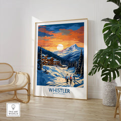 Whistler Print in a large natural wood frame leaning in a room with a rattan chair and monstera plant