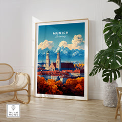 Munich Travel Print in a large natural wood frame leaning in a room with a rattan chair and monstera plant