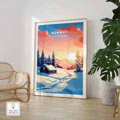 Norway Art Print in a large natural wood frame leaning in a room with a rattan chair and monstera plant