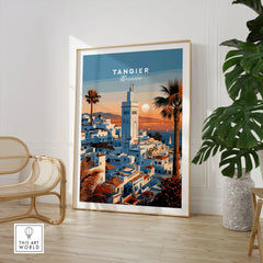 Tangier Morocco Sunset Medina Travel Poster — Tangier medina rooftops and a minaret above a bay dotted with sails, shown as large framed print room setting chair plant
