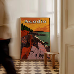 Acadia National Park travel poster framed on floor, coastal cliff art, man walking past