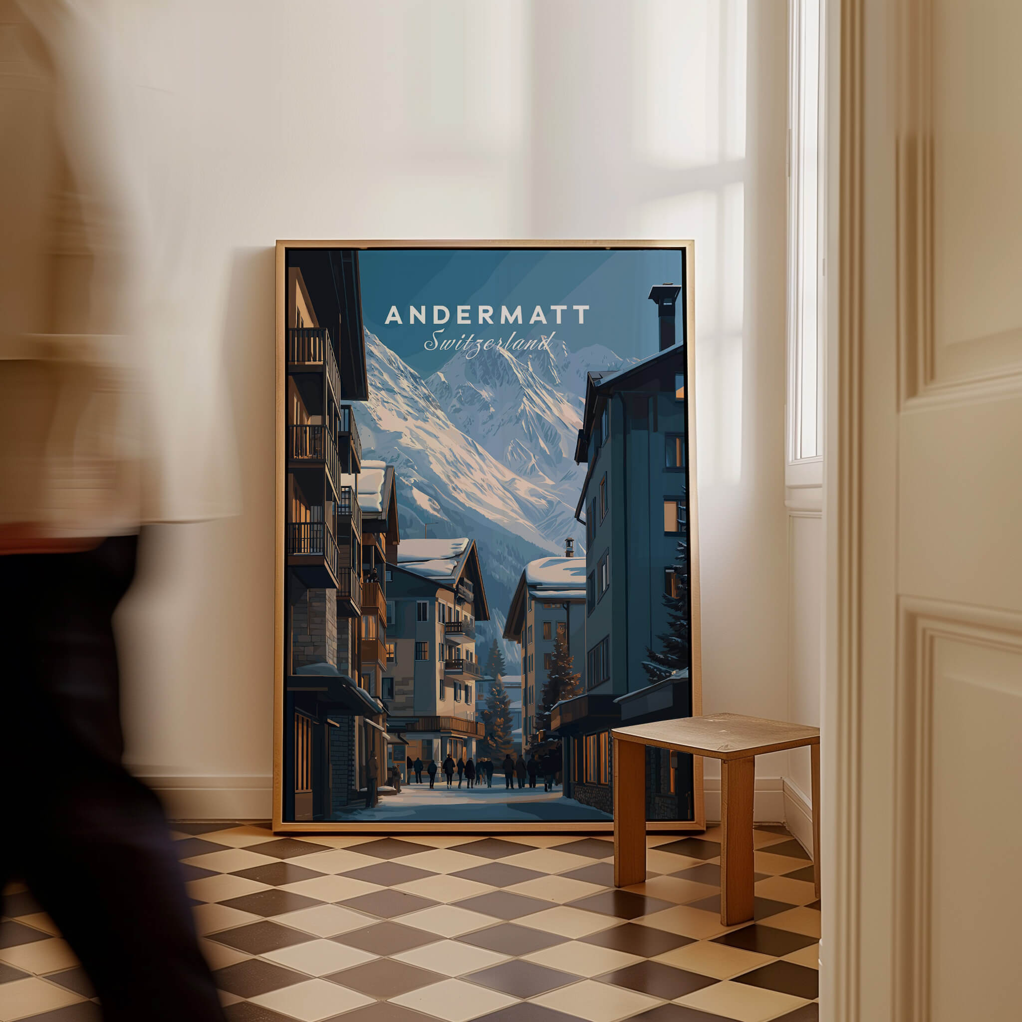 Andermatt Travel Poster – Swiss Alps Winter Village and Chalet Print displayed in a cozy interior.