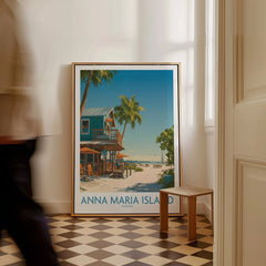 Framed Anna Maria Island Florida travel poster with beach scene leaning on wall indoors