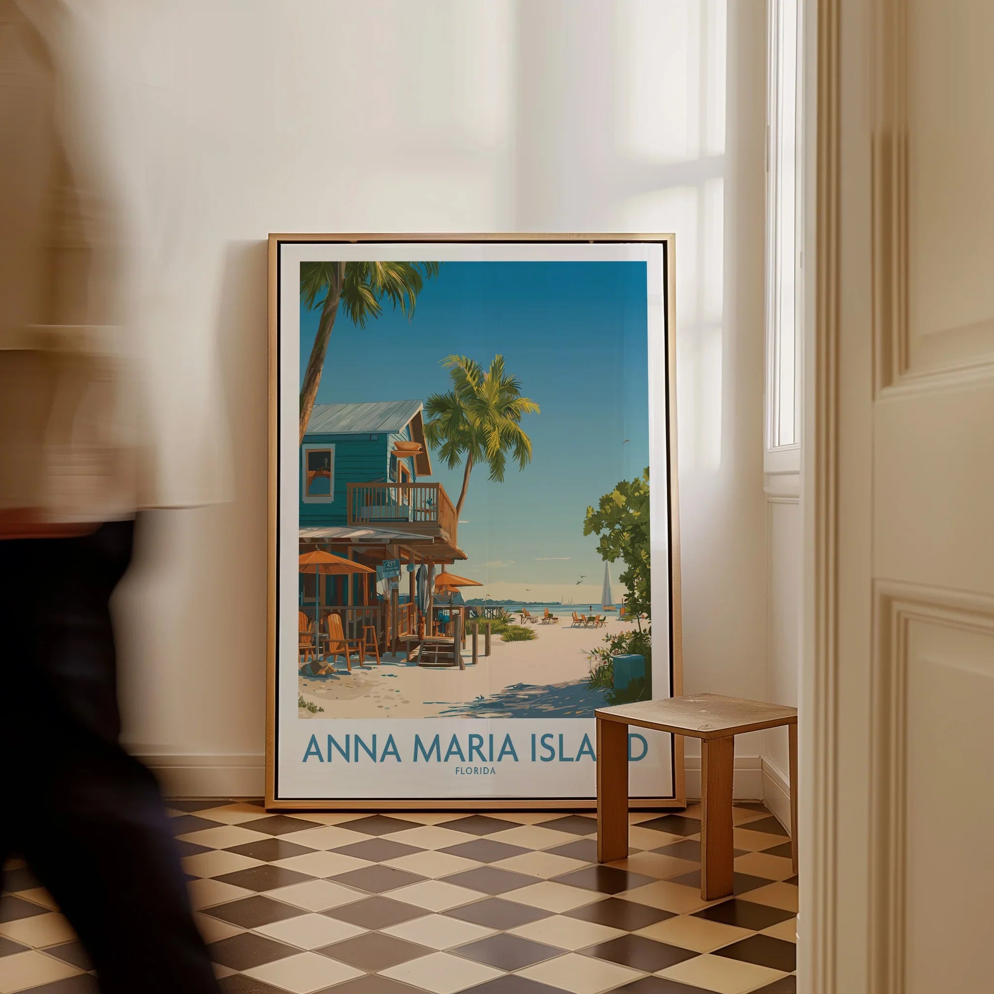 Framed Anna Maria Island Florida travel poster with beach scene leaning on wall indoors