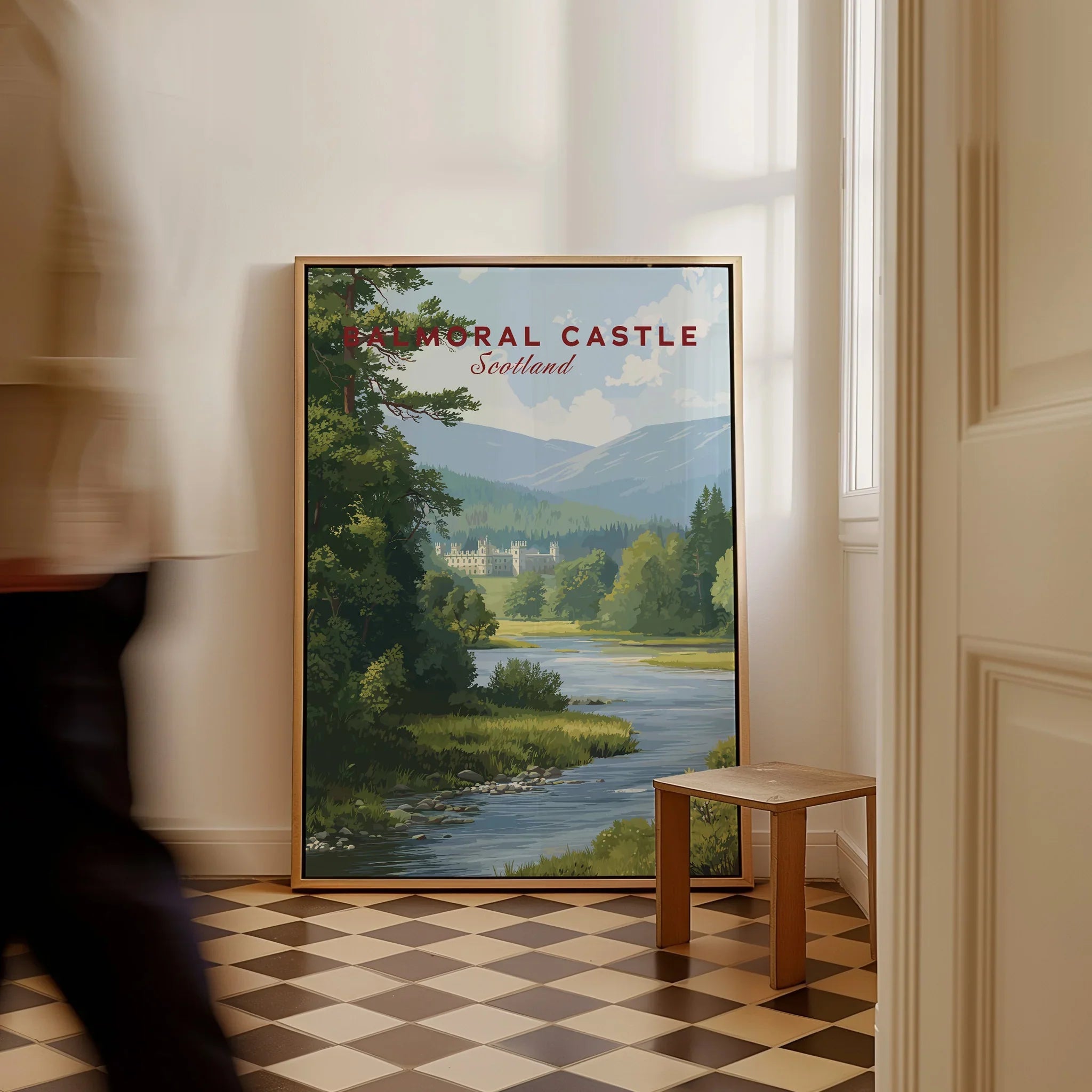 Framed Balmoral Castle Scotland travel poster with river and mountains on checkered floor