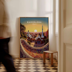 Barcelona Travel Poster Print showcasing colorful architecture and a sunset in a stylish indoor setting.