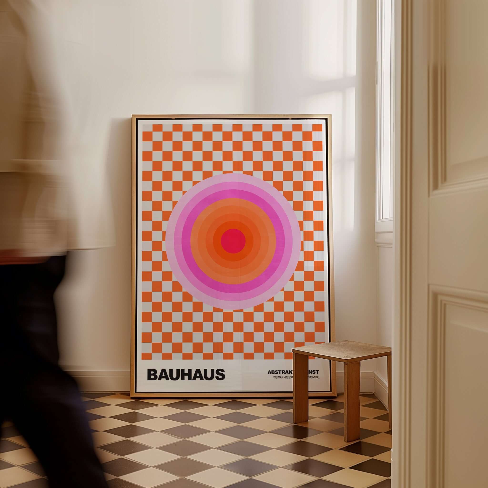 Bauhaus Exhibition Prints - Pink Circles Poster Orange Checkerboard Art displayed in a stylish interior, framed poster.