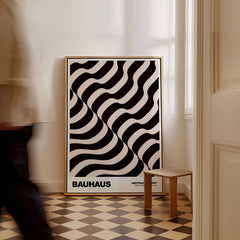 Bauhaus Exhibition Prints - Thick Undulating Waves Poster Black Cream Abstract Art displayed in a stylish interior.