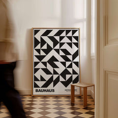 Bauhaus Exhibition Prints - Geometric Triangle Pattern Poster Black White Abstract displayed in a modern interior.