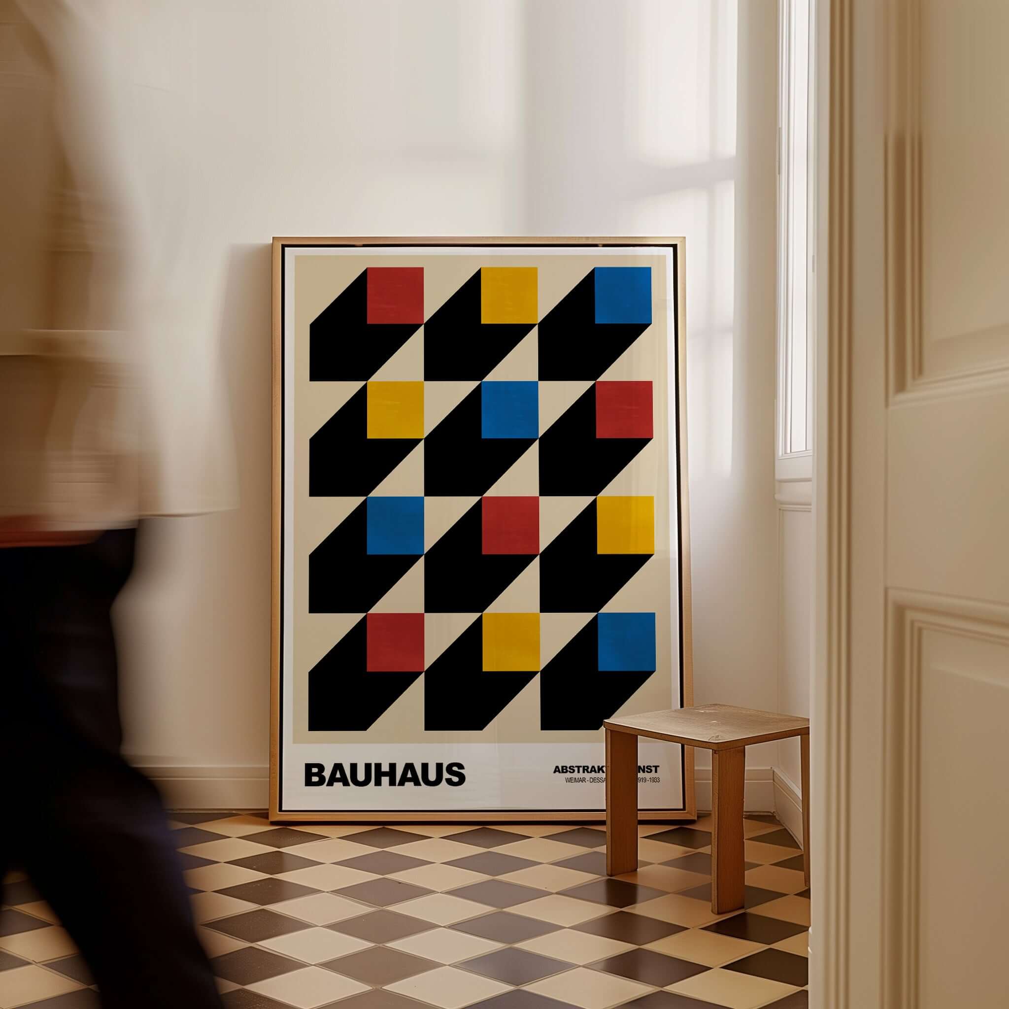 Bauhaus Exhibition Prints - Isometric Cubes Art Print Red Yellow Blue Design displayed in a stylish interior with geometric pattern.
