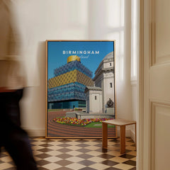 Framed Birmingham England city skyline wall art poster leaning on floor in bright room