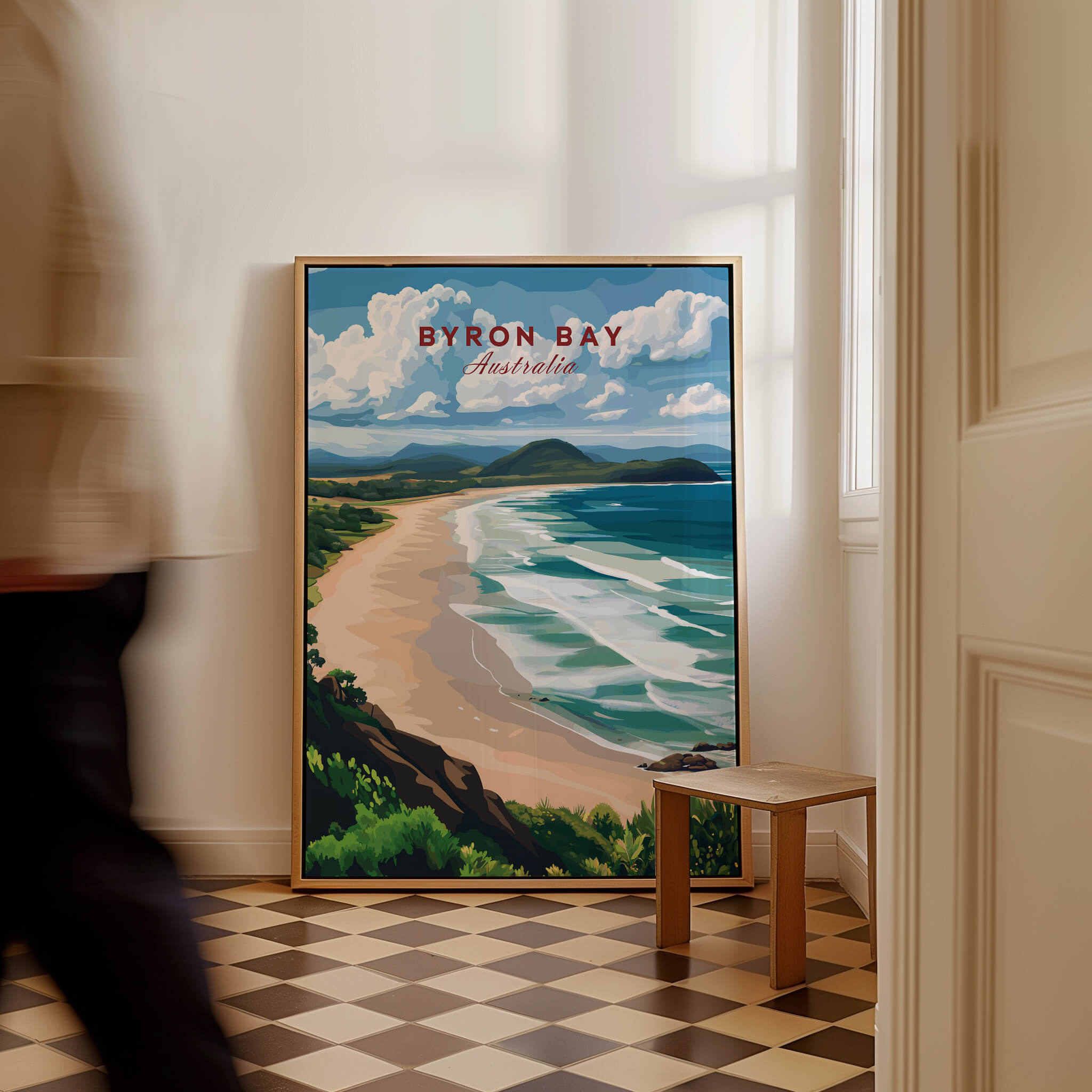 Byron Bay Beach Print - Australia Wall Art featuring serene coastal landscape with beach and waves in a stylish interior setting.