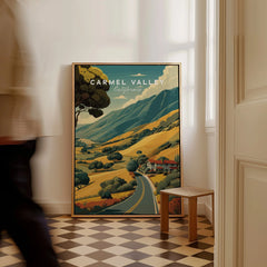 Framed Carmel Valley California travel poster on checkered floor with person walking by
