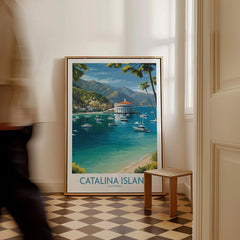 Framed Catalina Island travel poster art on floor in sunlit room with checkered tiles.