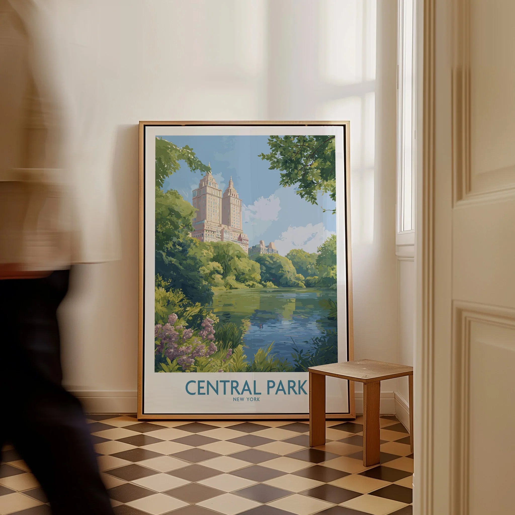Framed Central Park New York travel poster on floor in stylish home interior