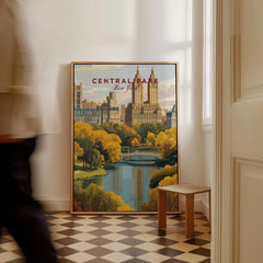 Central Park New York travel poster framed on floor, city skyline, autumn trees, indoor decor