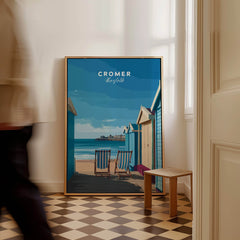 Cromer Travel Poster – Norfolk Beach Huts Art Print showcasing colorful beach huts and a serene coastal view.