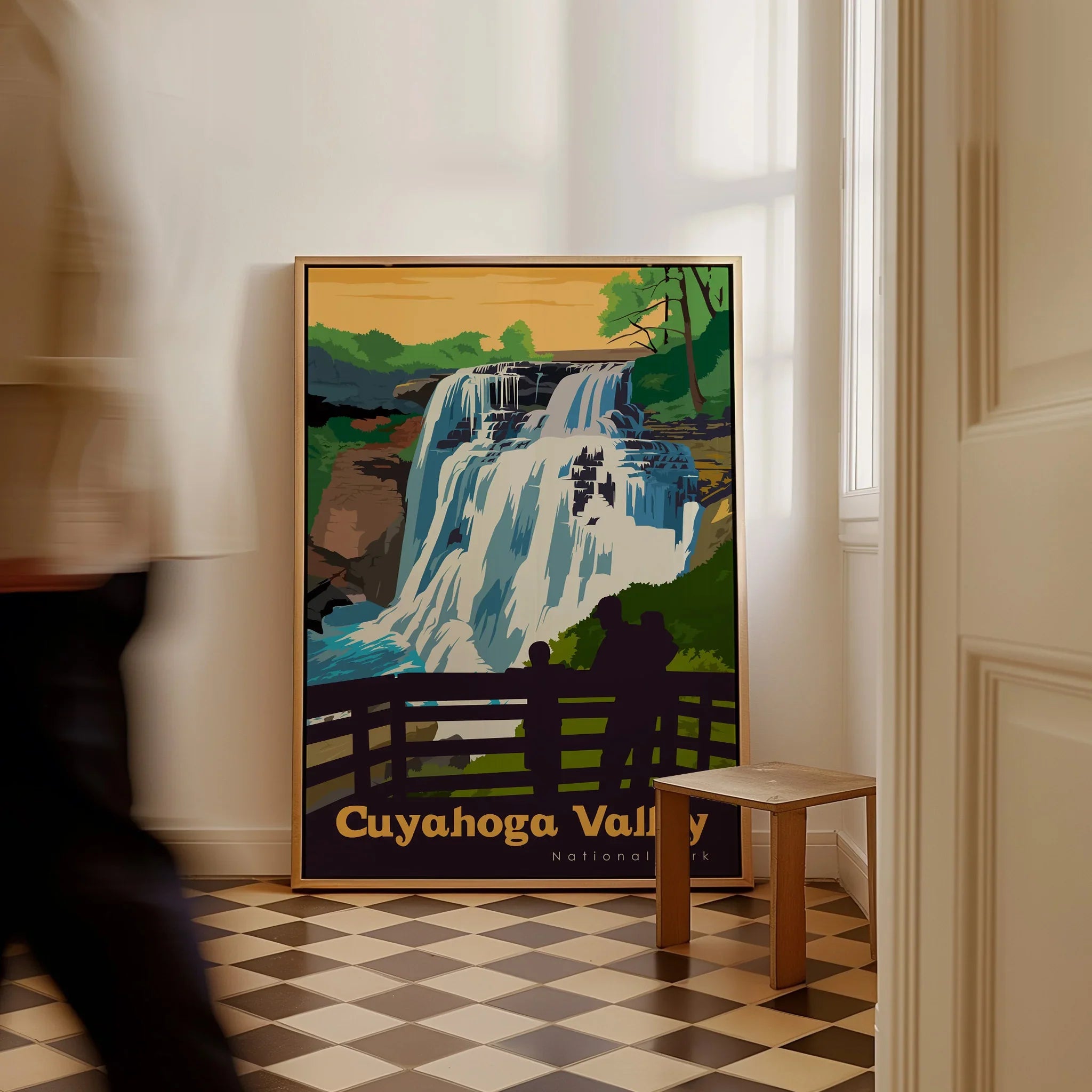 Cuyahoga Valley National Park waterfall travel poster in frame on floor, man walking past