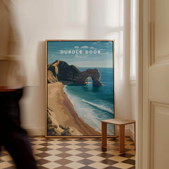 Durdle Door Poster – Jurassic Coast Wall Art showcasing limestone arch and turquoise waters in a stylish interior.