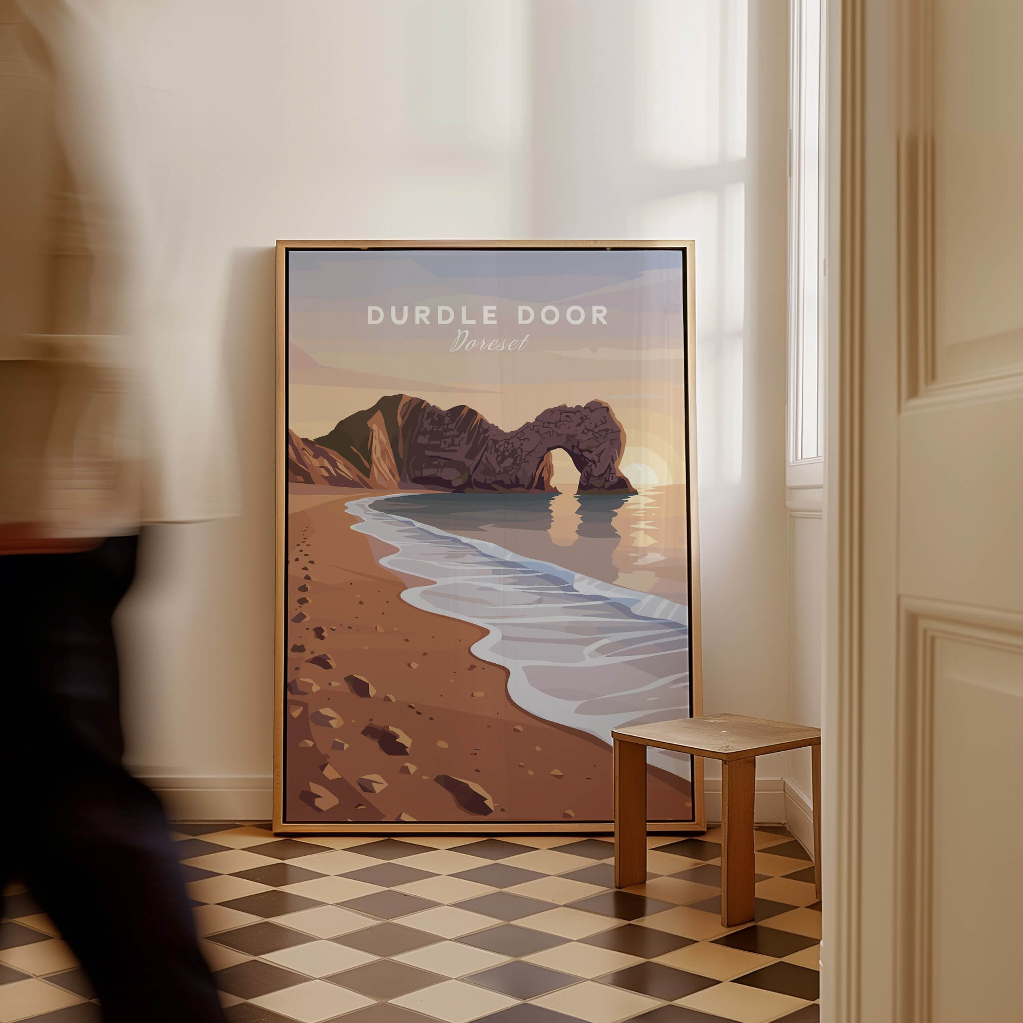 Durdle Door Travel Poster – Jurassic Coast Sunset Art displayed in a stylish interior with a beach scene.