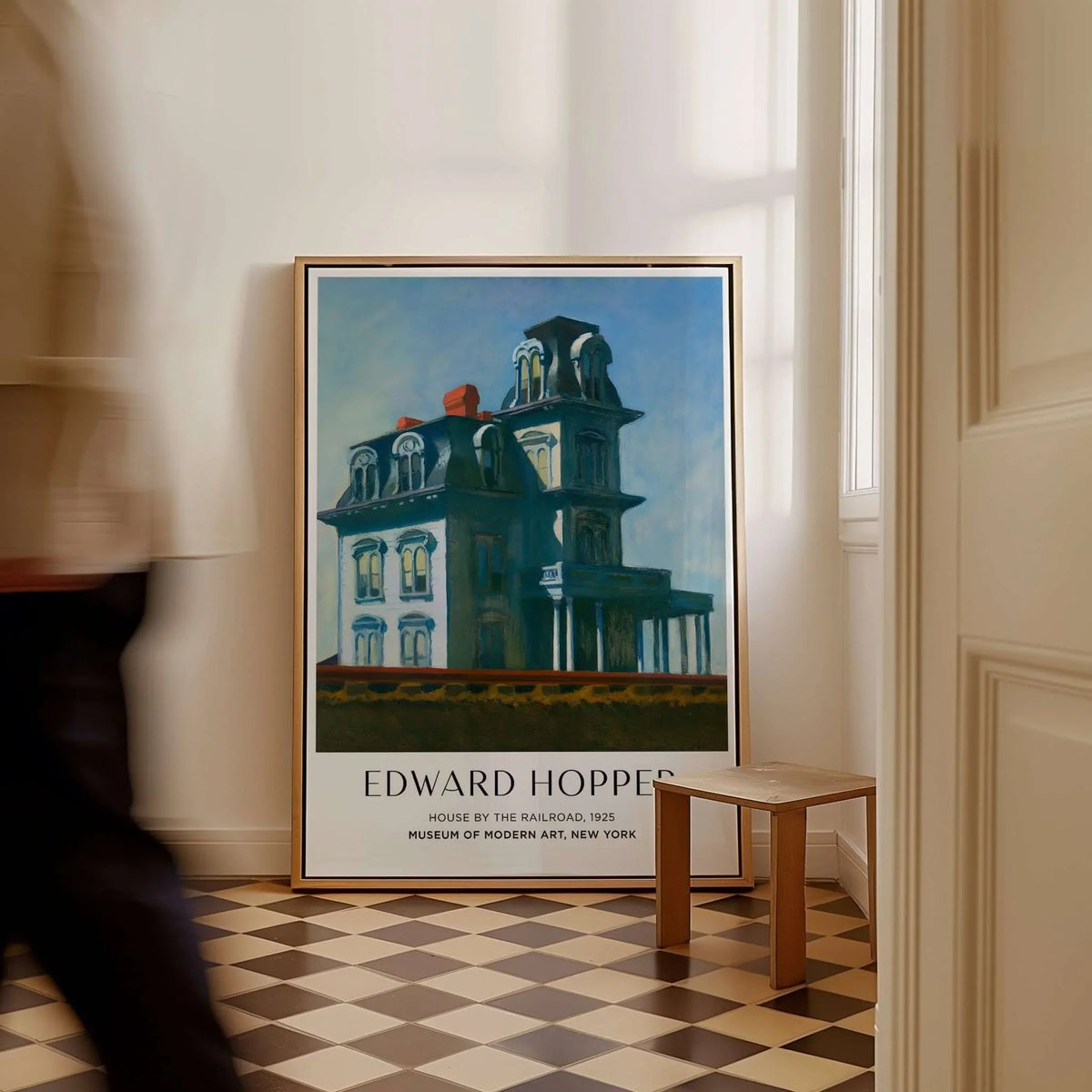 Edward Hopper House by the Railroad 1925 MoMA Art Print Poster displayed in a stylish interior setting.
