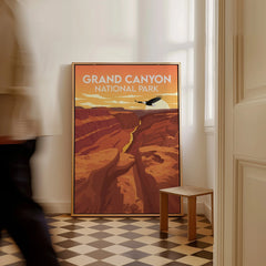 Framed Grand Canyon National Park travel poster leaning on floor in bright hallway