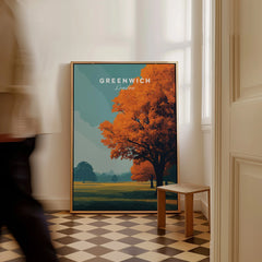 Framed Greenwich London travel poster with autumn tree on checkered floor, man walking past