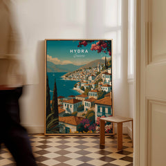 Hydra Greece Wall Art Print | Mediterranean Coastal Town Travel Poster in an interior setting with a person walking by.