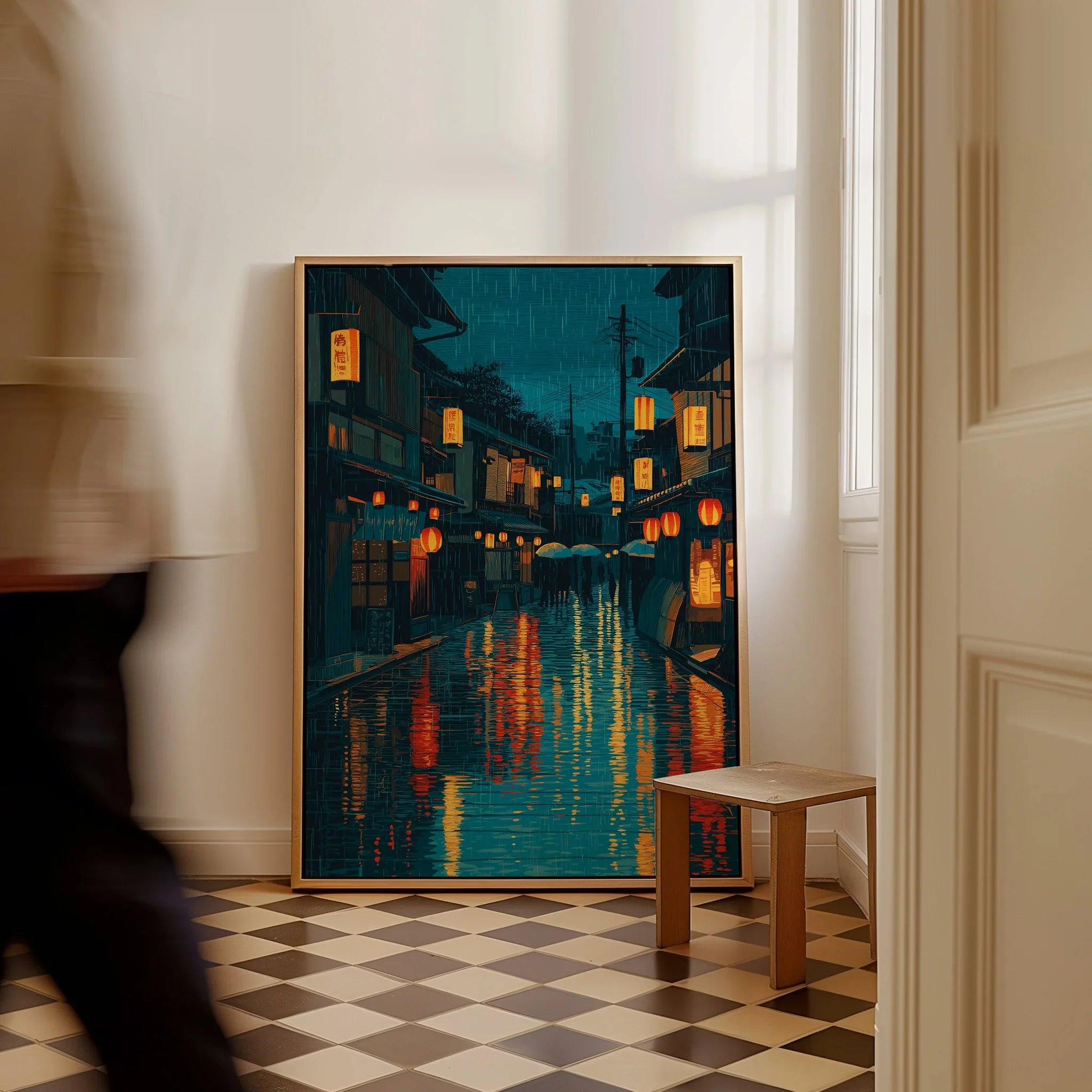 Framed Japan street art print with lanterns on floor in modern hallway, person walking by