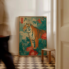 Framed Japanese tiger art print with floral design leaning on floor in modern hallway.
