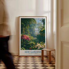 Framed Kew Gardens travel poster with lush botanical artwork on checkered floor, hallway decor
