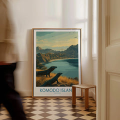 Framed Komodo Island travel poster on floor, man walking by, tiled hallway, natural light