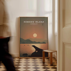 Framed Komodo Island travel poster with sunset, Komodo dragon, and ocean scene on floor