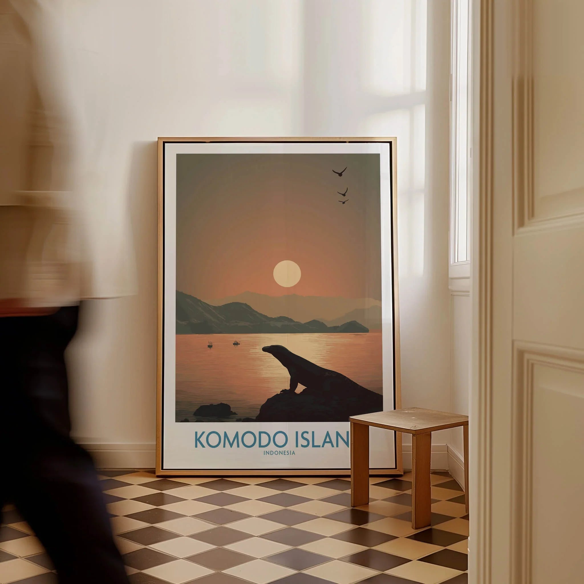 Framed Komodo Island travel poster with sunset, silhouette, and ocean on tiled floor