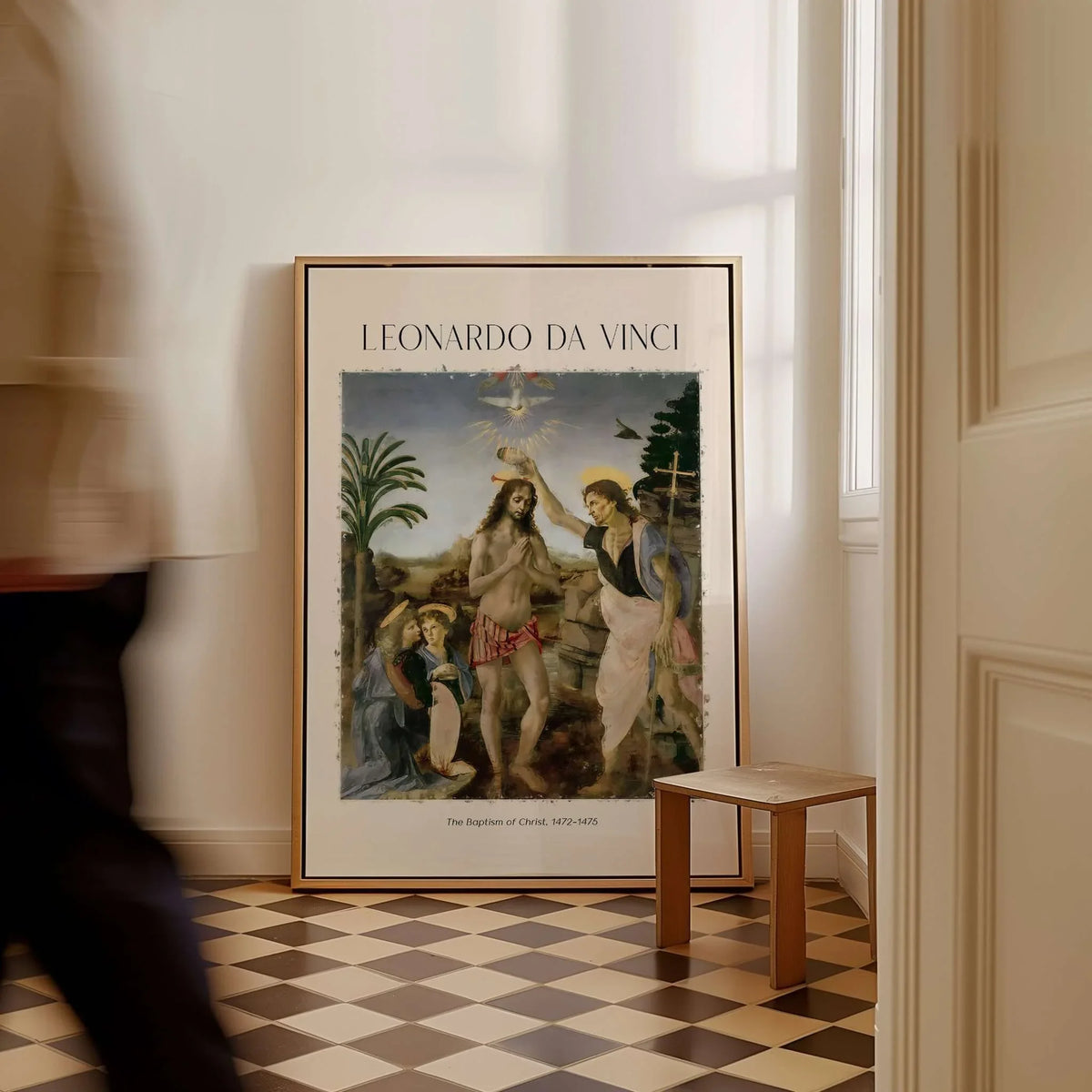 Leonardo da Vinci Art Print The Baptism of Christ 1470s displayed in a bright room with stylish decor.