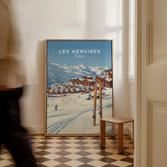 Framed Les Menuires France ski resort travel poster on floor in modern home entryway