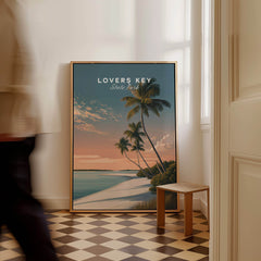 Lovers Key Travel Poster | Florida Sunset Palm Trees Wall Art Print displayed in a stylish interior with a person walking by.