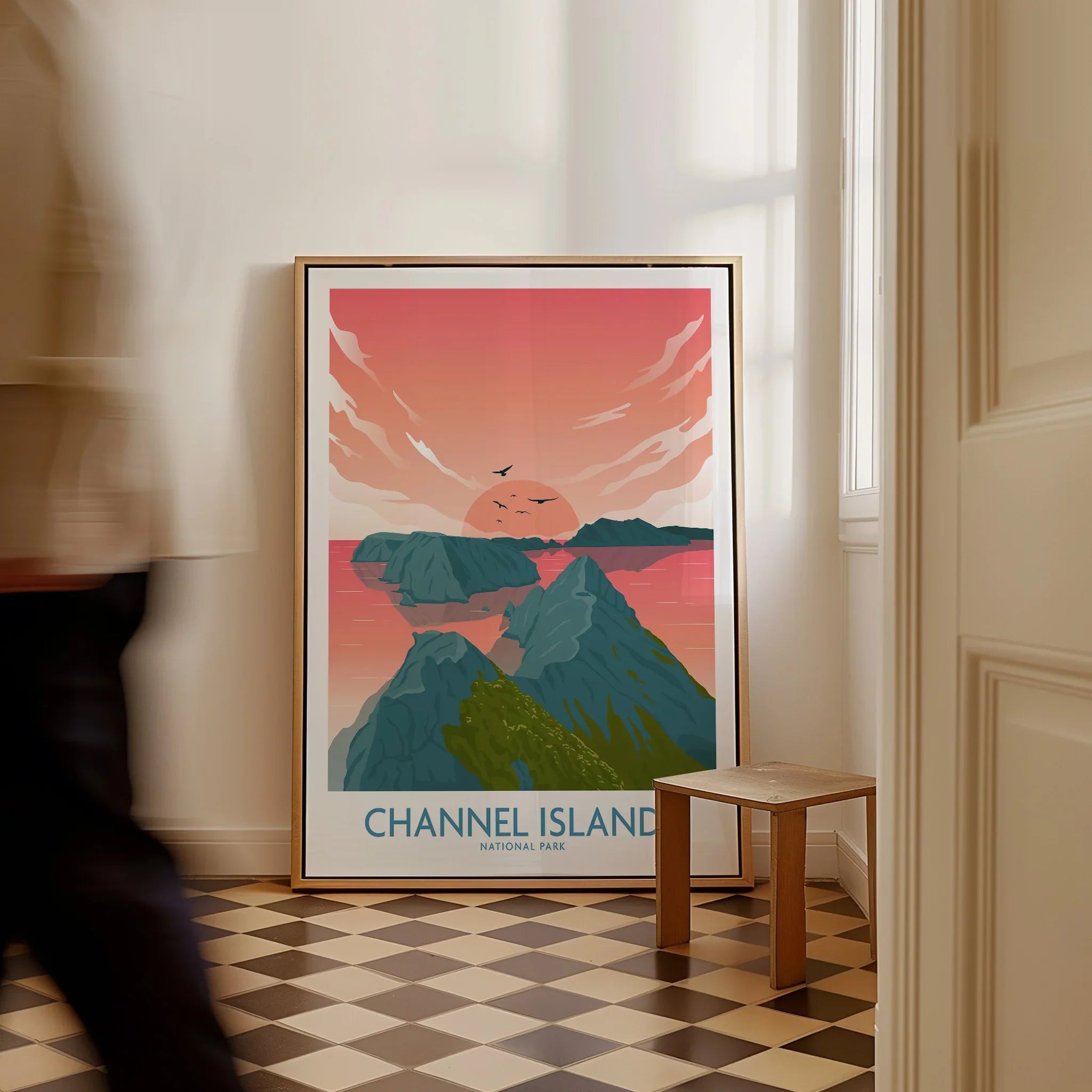 Framed Channel Islands National Park art print with sunset, placed on checkered floor.