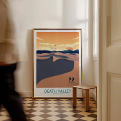 Framed Death Valley National Park poster with desert landscape leaning on the floor