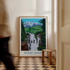 Framed Mount Rainier National Park art print with waterfall on floor in modern hallway