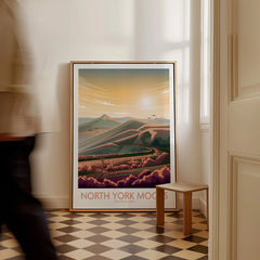 Framed North York Moors National Park travel poster on floor in bright hallway