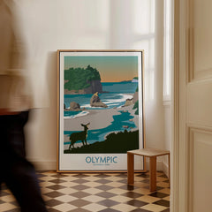 Framed Olympic National Park travel poster with coastal landscape art on floor in hallway