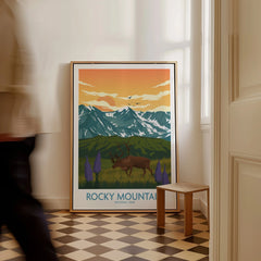 Framed Rocky Mountain National Park art print with elk, mountains, and sunset on the floor.