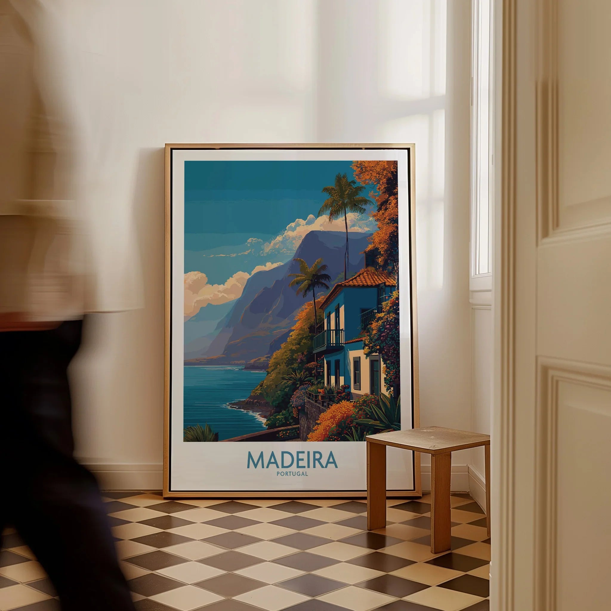 Framed Madeira Portugal travel poster with coastal landscape leaning on checkered floor wall art
