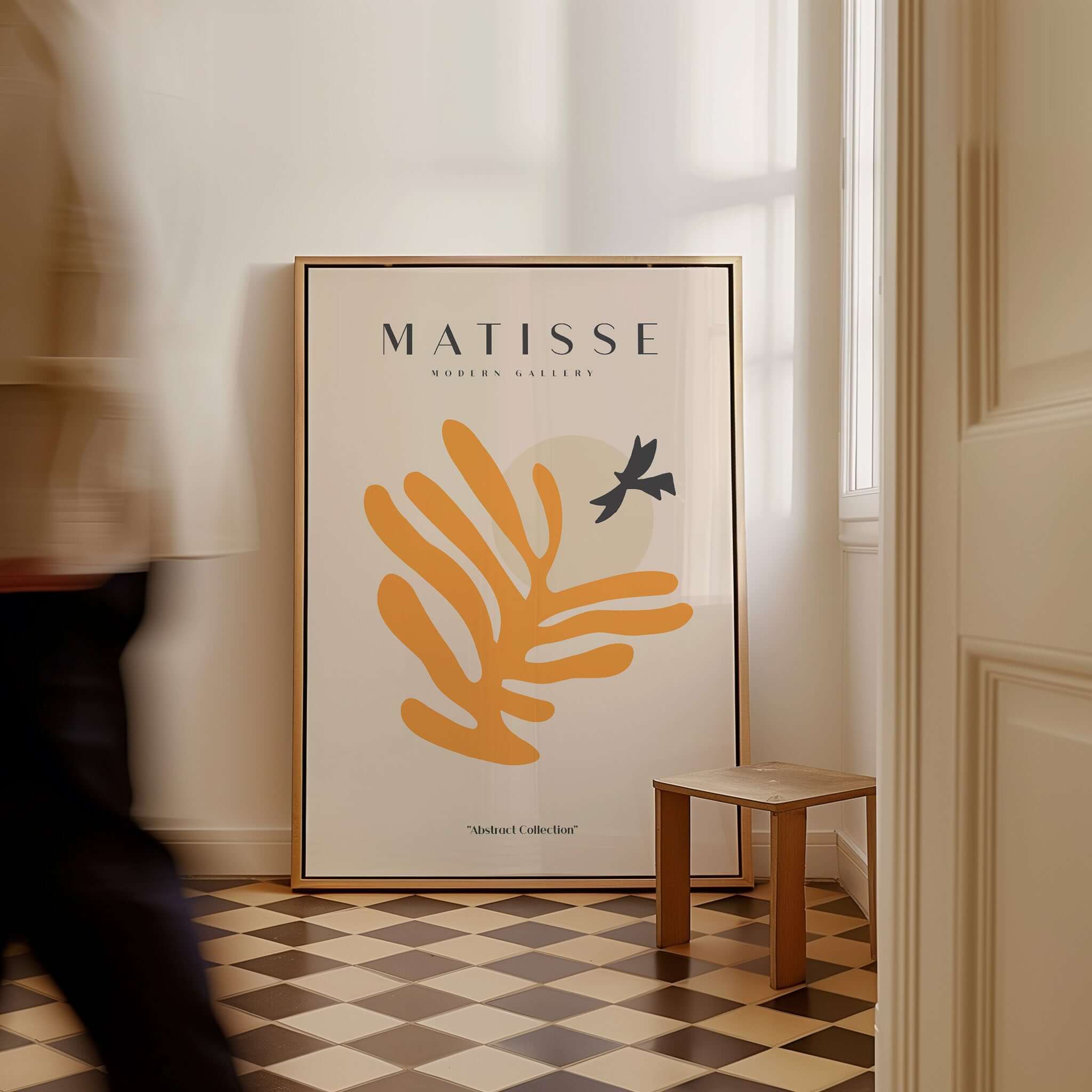 Matisse Art Prints - Orange Leaf Bird Silhouette Poster displayed in a modern interior setting with a brown and beige floor.