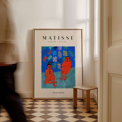Matisse Art Prints -  Two Figures Flute Poster displayed in a modern interior with vibrant colors and two figures.