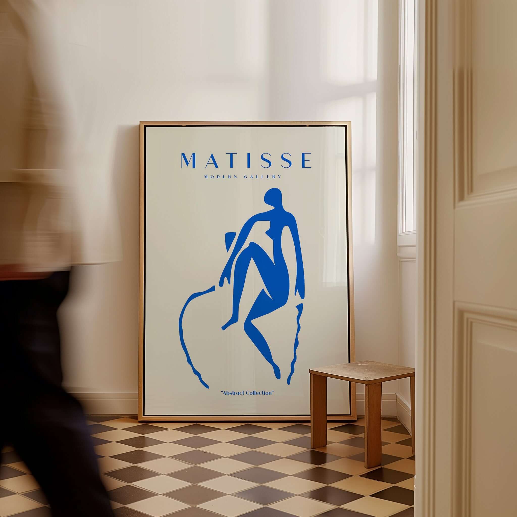 Matisse Art Prints -  Blue Nude Seated Figure Poster displayed in a modern interior with a beige background.